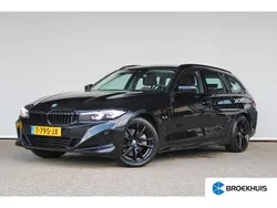 Zwart Gebruikt 2023 BMW 320e Stationwagen | € 35.895 (Eerlijke prijs)