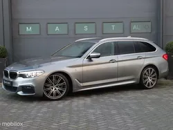 Grijs, metallic lak Gebruikt 2018 BMW 520 Executive Stationwagen | € 32.740 (Iets duurder)