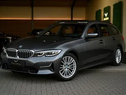 Grijs Gebruikt 2020 BMW 320 Executive Stationwagen | € 23.950 (Eerlijke prijs)