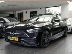 Zwart Gebruikt 2023 Mercedes C300e AMG line Sedan | € 49.950 (Eerlijke prijs)