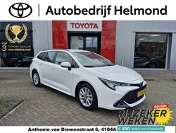 Wit Gebruikt 2023 Toyota Corolla Hybrid Active Stationwagen | € 27.799