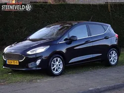 Zwart, metallic lak Gebruikt 2021 Ford Fiesta Titanium Hatchback | € 14.950 (Eerlijke prijs)