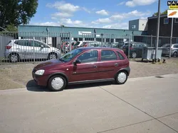 Rood, metallic lak Gebruikt 2002 Opel Corsa Comfort Hatchback | € 1.450 (Eerlijke prijs)