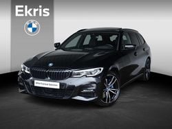Zwart (metallic) Gebruikt 2022 BMW 330e Comfort Edition Stationwagen | € 36.895 (Iets duurder)