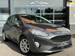 Grijs, metallic lak Gebruikt 2018 Ford Fiesta Titanium Hatchback | € 13.440 (Eerlijke prijs)
