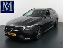 Zwart Gebruikt 2022 Mercedes E300 AMG line Stationwagen | € 42.899 (Eerlijke prijs)