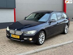Blauw Gebruikt 2012 BMW 330 Executive Stationwagen | € 7.499
