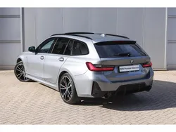 Skyscraper grey (grijs metallic) Gebruikt 2024 BMW 330e Comfort Edition Stationwagen | € 52.950 (Eerlijke prijs)