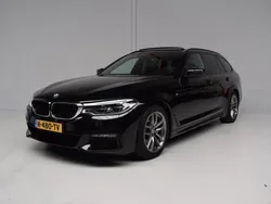 Zwart, metallic lak Gebruikt 2020 BMW 520 M Sport Stationwagen | € 32.945 (Goede deal)