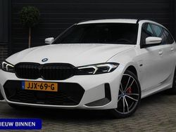 Wit Gebruikt 2023 BMW 320e M Sport Stationwagen | € 37.995 (Eerlijke prijs)