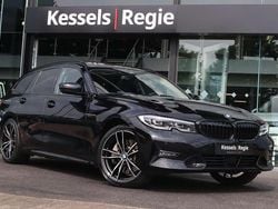 Zwart Gebruikt 2021 BMW 330e Sport Line Stationwagen | € 32.950 (Eerlijke prijs)