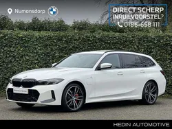 Wit Gebruikt 2024 BMW 320e M Sport Stationwagen | € 47.890 (Eerlijke prijs)