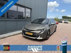 Groen, metallic lak Gebruikt 2019 Toyota Corolla Premium Stationwagen | € 19.950 (Eerlijke prijs)
