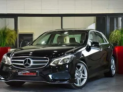 Zwart Gebruikt 2014 Mercedes E350 AMG Sedan | € 26.950 (Eerlijke prijs)