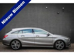 Grijs, metallic lak Gebruikt 2016 Mercedes CLA180 Shooting Brake OrangeArt Edition Stationwagen | € 15.950 (Iets duurder)