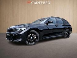 Zwart, metallic lak Gebruikt 2022 BMW 330e M Sport Stationwagen | € 34.895 (Eerlijke prijs)