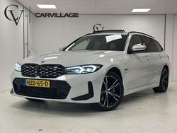 Wit Gebruikt 2022 BMW 330e M Sport Stationwagen | € 41.445 (Eerlijke prijs)