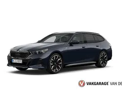 Zwart Gebruikt 2025 BMW 550e M Sport Stationwagen | € 94.950