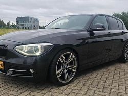 Zwart, metallic lak Gebruikt 2014 BMW 116 Executive Hatchback | € 7.455 (Eerlijke prijs)