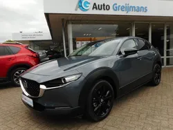 Grijs, metallic lak Gebruikt 2024 Mazda CX-30 Homura-Line SUV | € 32.995 (Iets duurder)