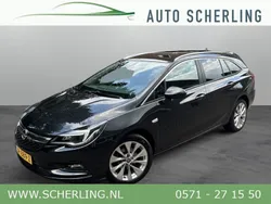 Zwart, metallic lak Gebruikt 2016 Opel Astra Edition Stationwagen | € 9.850 (Eerlijke prijs)