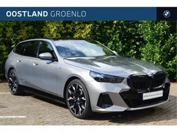 Grijs Gebruikt 2025 BMW 550e M Sport Stationwagen | € 99.950 (Goede deal)