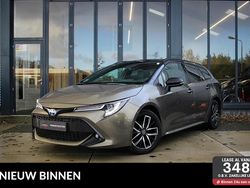 Bruin Gebruikt 2022 Toyota Corolla Active Stationwagen | € 25.995