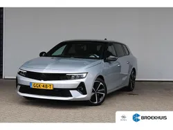 Grijs, metallic lak Gebruikt 2024 Opel Astra Stationwagen | € 27.900 (Super prijs)