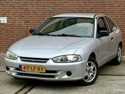 Grijs Gebruikt 2003 Mitsubishi Colt Hatchback | € 1.650