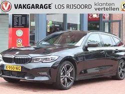 Zwart Gebruikt 2021 BMW 330e Stationwagen | € 25.500 (Goede deal)