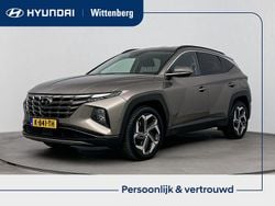 Silky bronze metallic (b6s) Gebruikt 2021 Hyundai Tucson Comfort SUV | € 23.900 (Eerlijke prijs)