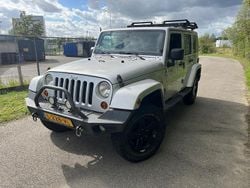 Grijs (metallic) Gebruikt 2012 Jeep Wrangler Unlimited Sahara SUV | € 17.400