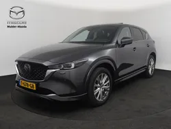 Machine gray (grijs metallic) Gebruikt 2023 Mazda CX-5 Takumi-Line SUV | € 41.450 (Duur)
