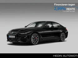 Saphirschwarz metallic (donker zwart metallic) Gebruikt 2024 BMW i4 Comfort Edition Sedan | € 48.880 (Goede deal)
