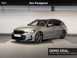 Skyscraper grey metallic (grijs metallic) Gebruikt 2025 BMW 318 M Sport Stationwagen | € 45.900 (Eerlijke prijs)