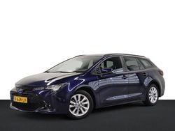 Blauw Gebruikt 2023 Toyota Corolla Hybrid Active Stationwagen | € 24.499