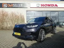 Zwart, metallic lak Gebruikt 2023 Honda ZR-V Hybrid SUV | € 39.900 (Eerlijke prijs)