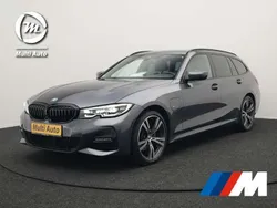 Grijs Gebruikt 2022 BMW 320e M Sport Stationwagen | € 32.740 (Super prijs)