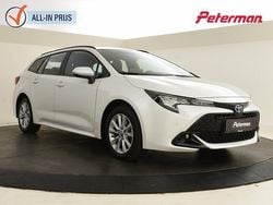 Wit Gebruikt 2023 Toyota Corolla Hybrid Active Stationwagen | € 27.899 (Eerlijke prijs)