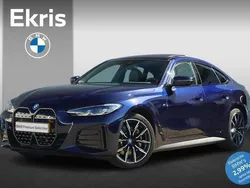 Blauw, metallic lak Gebruikt 2024 BMW i4 M Sport Sedan | € 48.900 (Super prijs)