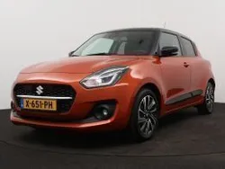 Oranje, metallic lak Gebruikt 2024 Suzuki Swift Style Hatchback | € 23.945 (Eerlijke prijs)