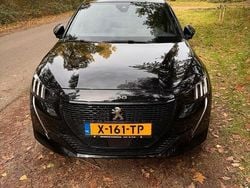 Zwart (metallic) Gebruikt 2023 Peugeot e-208 GT Hatchback | € 23.950