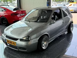 Grijs, metallic lak Gebruikt 1996 Opel Corsa Sport Hatchback | € 7.999