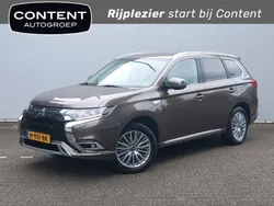 Bruin, metallic lak Gebruikt 2019 Mitsubishi Outlander P-HEV SUV | € 22.740 (Goede deal)