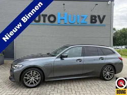 Grijs, metallic lak Gebruikt 2021 BMW 330 Executive Stationwagen | € 30.990 (Super prijs)