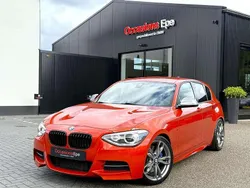 Oranje Gebruikt 2013 BMW M135 Shadowline Hatchback | € 22.900 (Iets duurder)