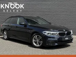 Zwart, metallic lak Gebruikt 2020 BMW 520 Executive Stationwagen | € 31.995 (Eerlijke prijs)