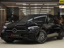 Zwart Gebruikt 2022 Mercedes C300e AMG Sedan | € 46.950 (Eerlijke prijs)