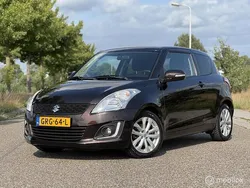 Bruin Gebruikt 2015 Suzuki Swift Exclusive Hatchback | € 7.250 (Eerlijke prijs)