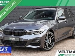 Grijs Gebruikt 2022 BMW 330e M Sport Stationwagen | € 34.945 (Goede deal)